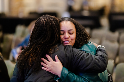 ac26_women_hugging_JA_3021-500p-72ppi.png