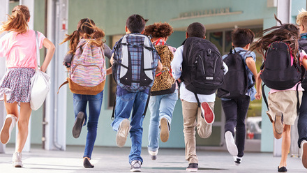 students running away from the camera